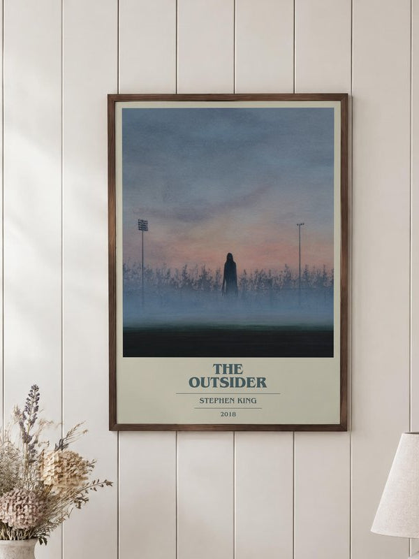 The Outsider poster, framed in a room