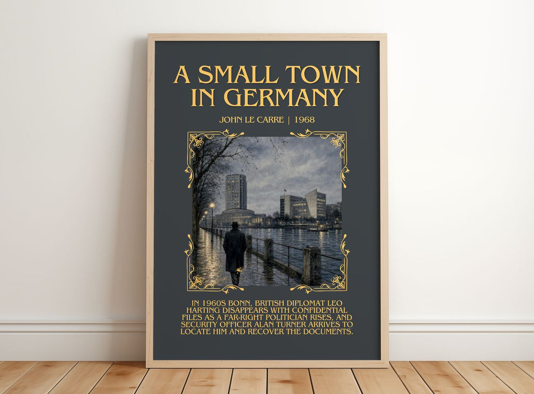 A Small Town in Germany Minimalist Book Poster by John le Carré – framed print leaning on a wooden floor