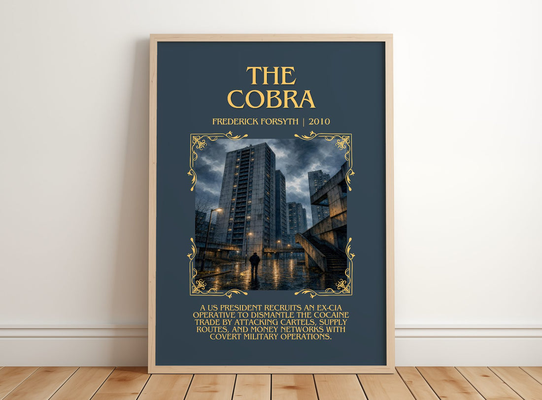 The Cobra Minimalist Book Poster by Frederick Forsyth – framed print leaning on a wooden floor