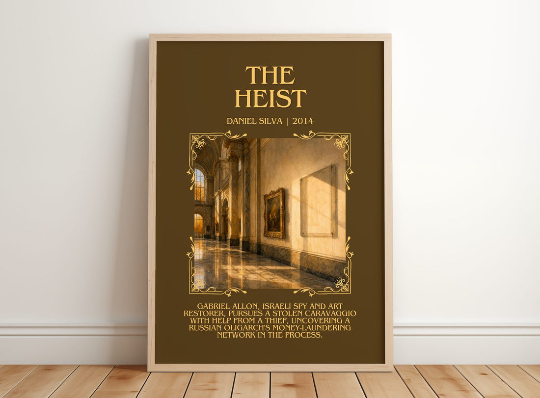 The Heist Minimalist Book Poster by Daniel Silva – framed print leaning on a wooden floor