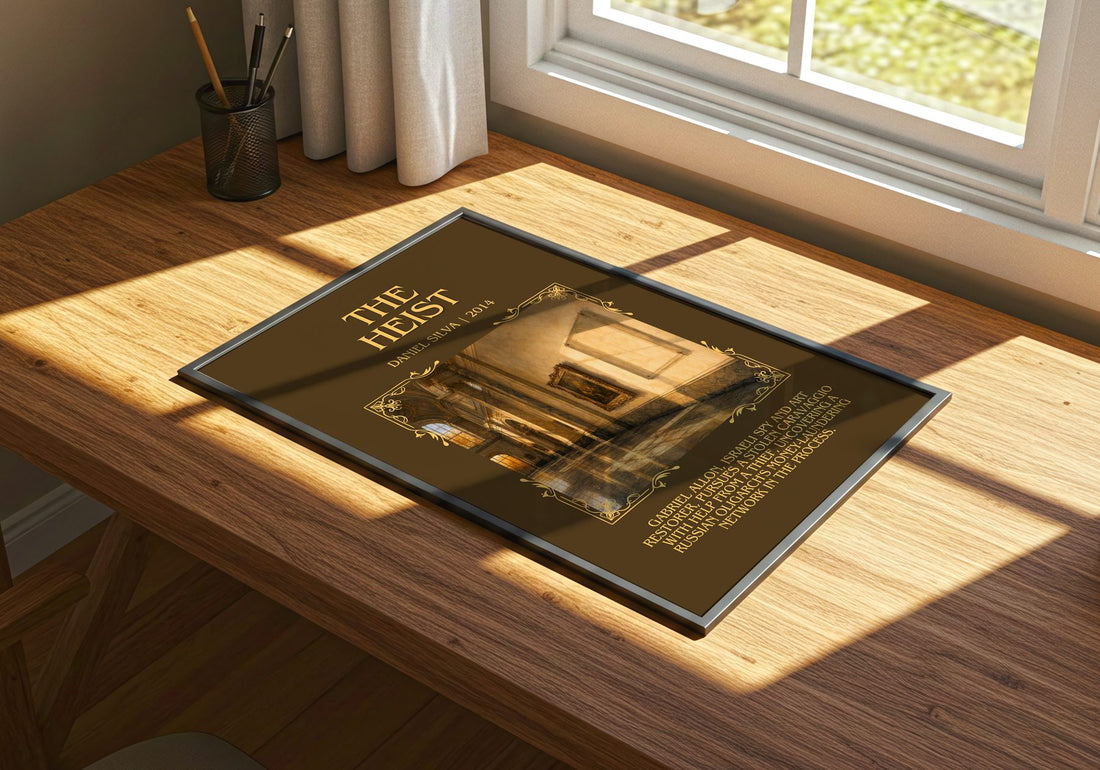 The Heist Minimalist Book Poster by Daniel Silva – print on a sunlit desk