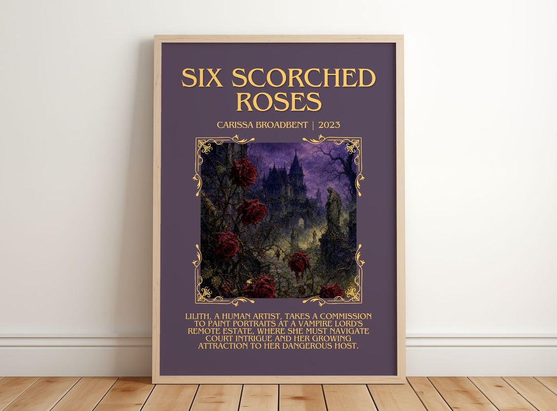 Six Scorched Roses Minimalist Book Poster by Carissa Broadbent – framed print leaning on a wooden floor