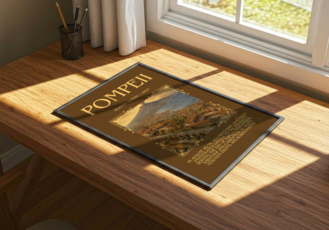 Pompeii Minimalist Book Poster by Robert Harris – print on a sunlit desk
