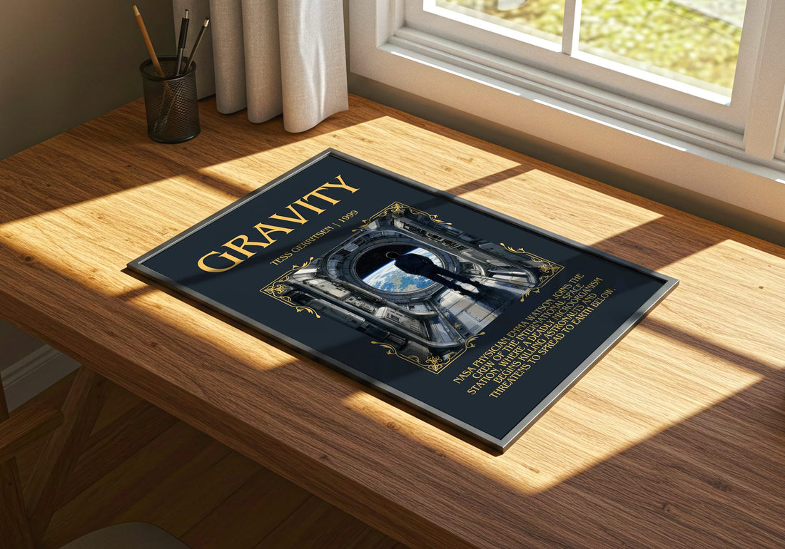 Gravity Minimalist Book Poster by Tess Gerritsen – print on a sunlit desk