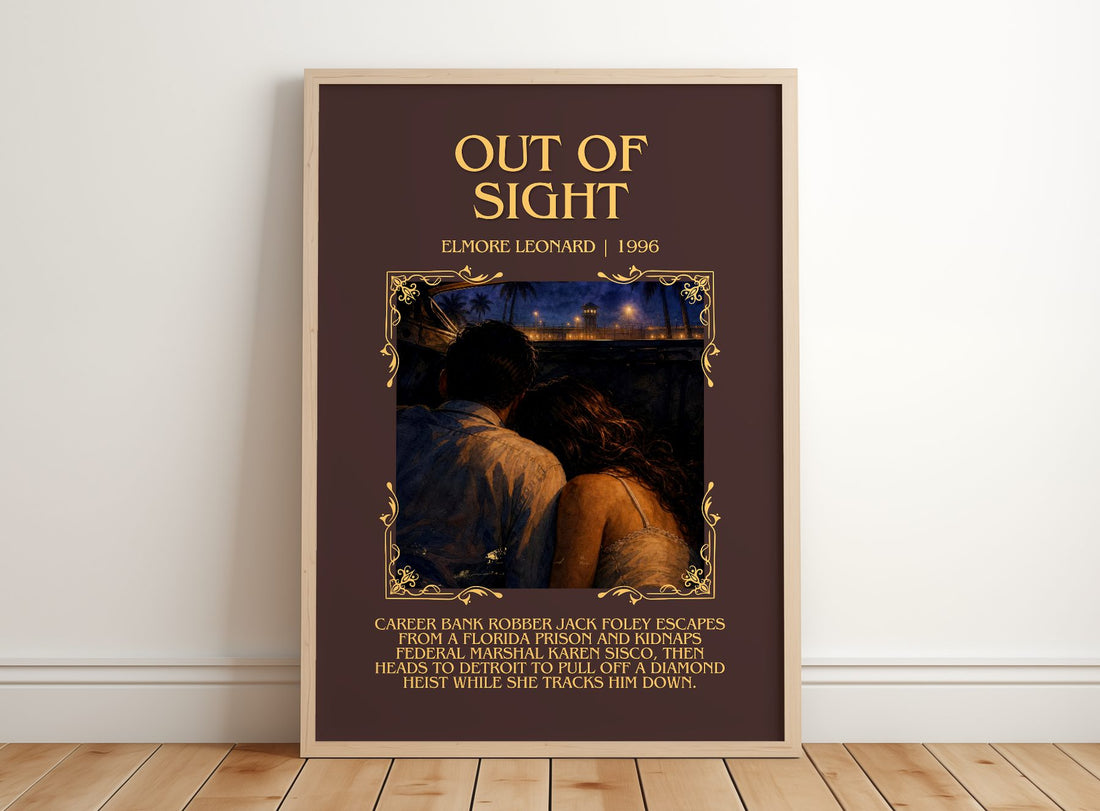Out of Sight Minimalist Book Poster by Elmore Leonard – framed print leaning on a wooden floor