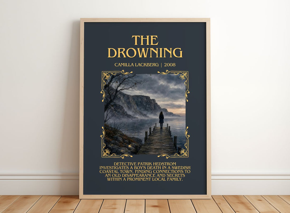 The Drowning Minimalist Book Poster by Camilla Läckberg – framed print leaning on a wooden floor