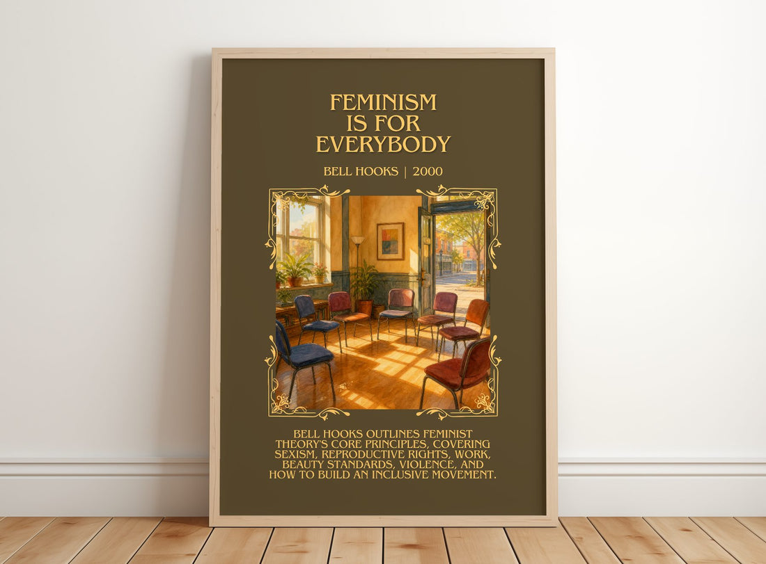 Feminism Is for Everybody Minimalist Book Poster by Bell Hooks – framed print leaning on a wooden floor