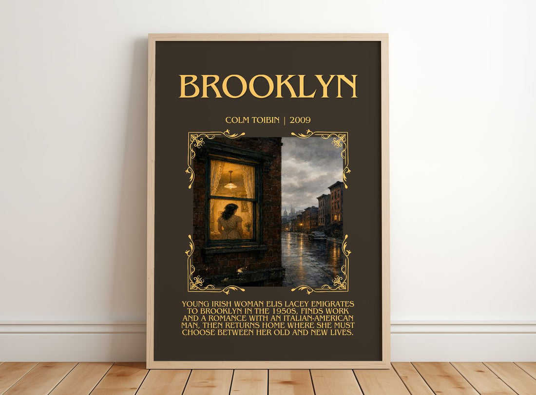 Brooklyn Minimalist Book Poster by Colm Toibin – framed print leaning on a wooden floor