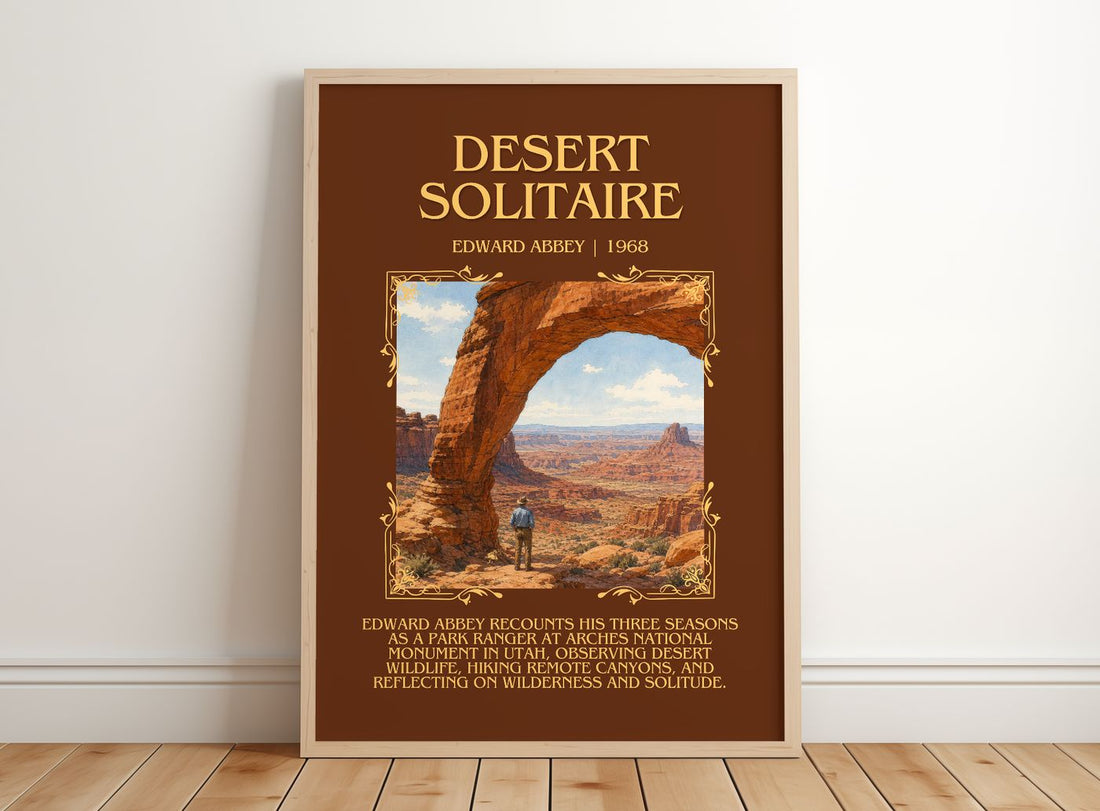 Desert Solitaire Minimalist Book Poster by Edward Abbey – framed print leaning on a wooden floor