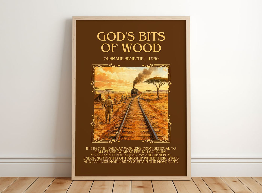 God's Bits of Wood Minimalist Book Poster by Ousmane Sembène – framed print leaning on a wooden floor