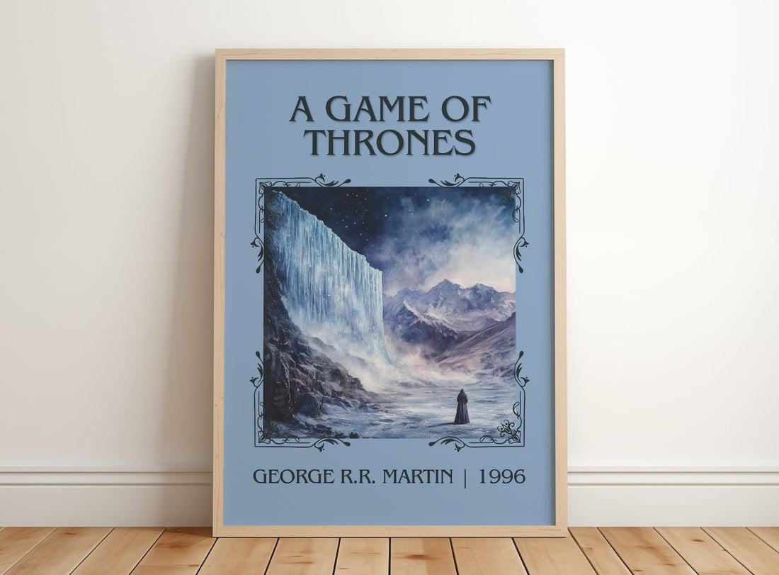 A Game Of Thrones Classic Book Art Print by George R.R. Martin – framed print leaning on a wooden floor