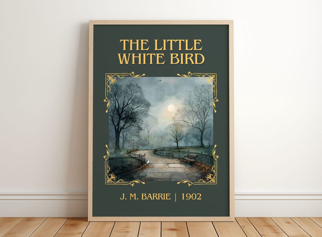 The Little White Bird Classic Book Art Print by J. M. Barrie – framed print leaning on a wooden floor