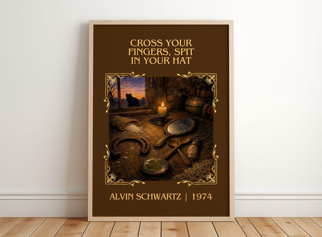 Cross Your Fingers, Spit In Your Hat Classic Book Art Print – framed print leaning on a wooden floor