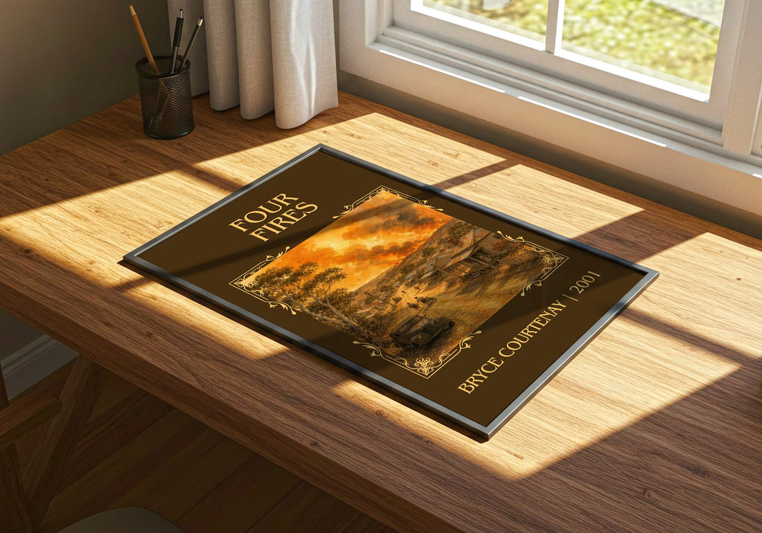 Four Fires Classic Book Art Print by Bryce Courtenay – print on a sunlit desk