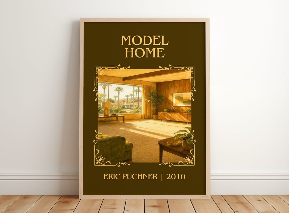 Model Home Classic Book Art Print by Eric Puchner – framed print leaning on a wooden floor