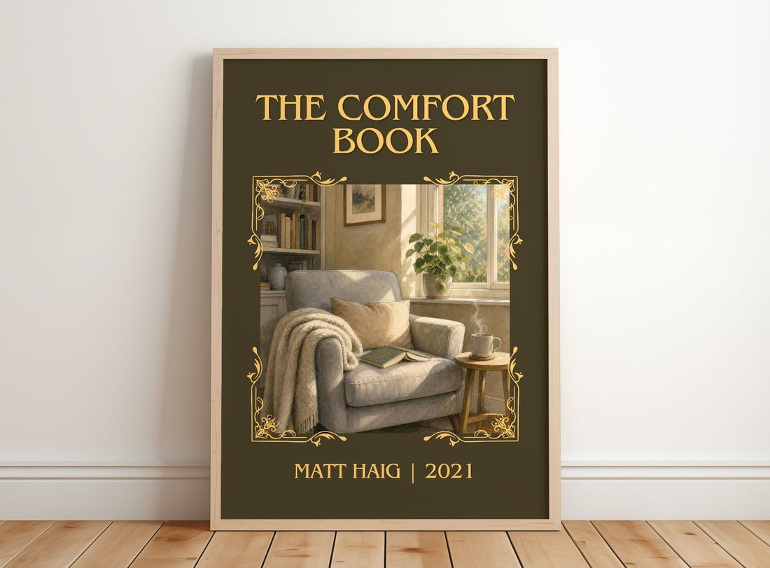 The Comfort Book Classic Book Art Print by Matt Haig – framed print leaning on a wooden floor