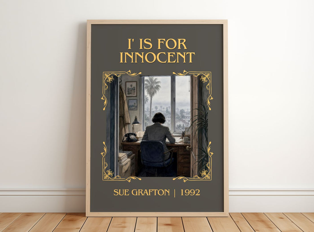 I' Is for Innocent Classic Book Art Print by Sue Grafton – framed print leaning on a wooden floor