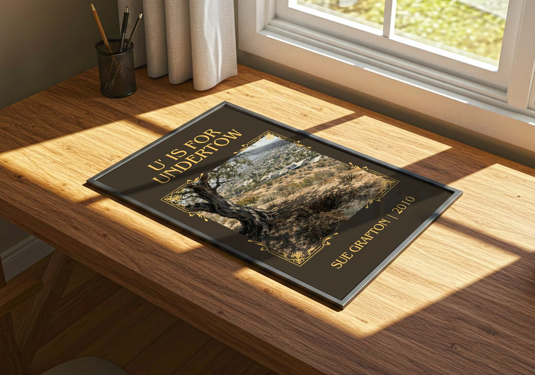 U' Is for Undertow Classic Book Art Print by Sue Grafton – print on a sunlit desk