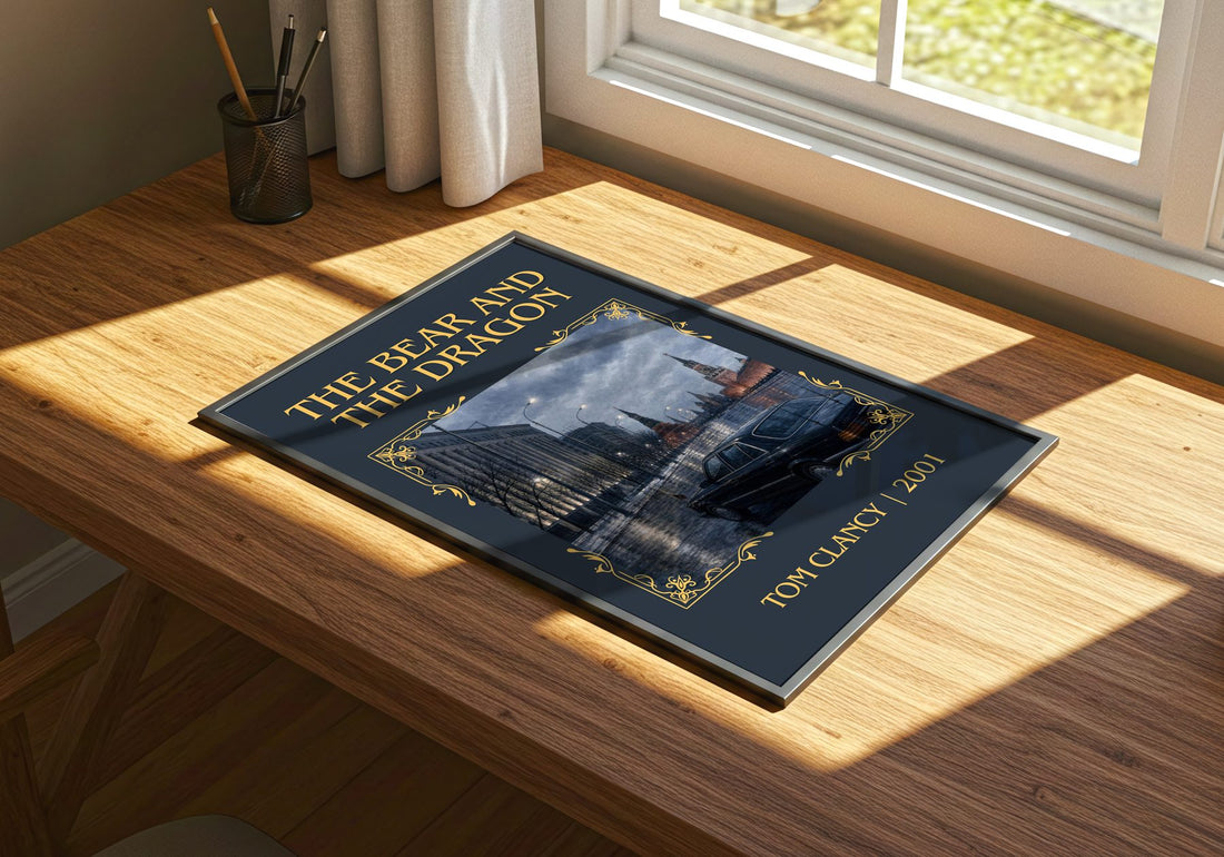 The Bear and the Dragon Classic Book Art Print by Tom Clancy – print on a sunlit desk