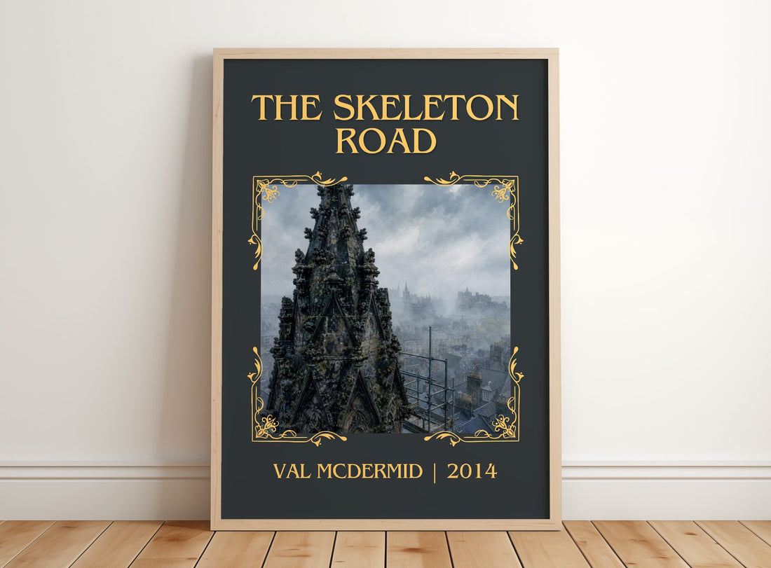 The Skeleton Road Classic Book Art Print by Val McDermid – framed print leaning on a wooden floor
