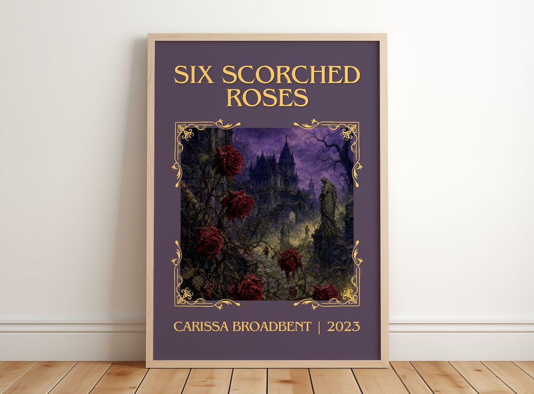 Six Scorched Roses Classic Book Art Print by Carissa Broadbent – framed print leaning on a wooden floor