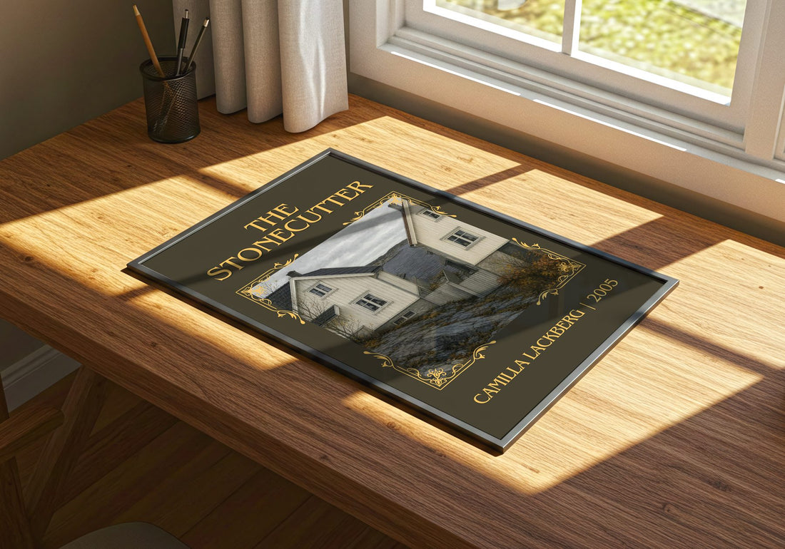 The Stonecutter Classic Book Art Print by Camilla Läckberg – print on a sunlit desk