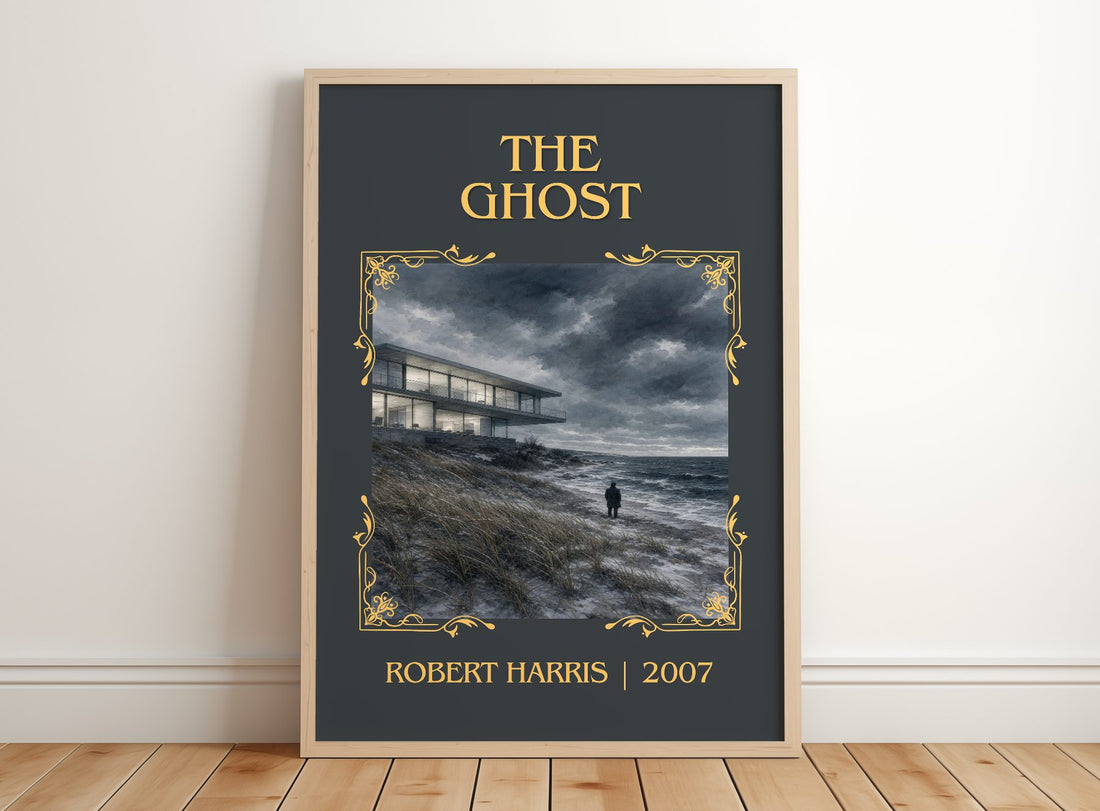 The Ghost Classic Book Art Print by Robert Harris – framed print leaning on a wooden floor