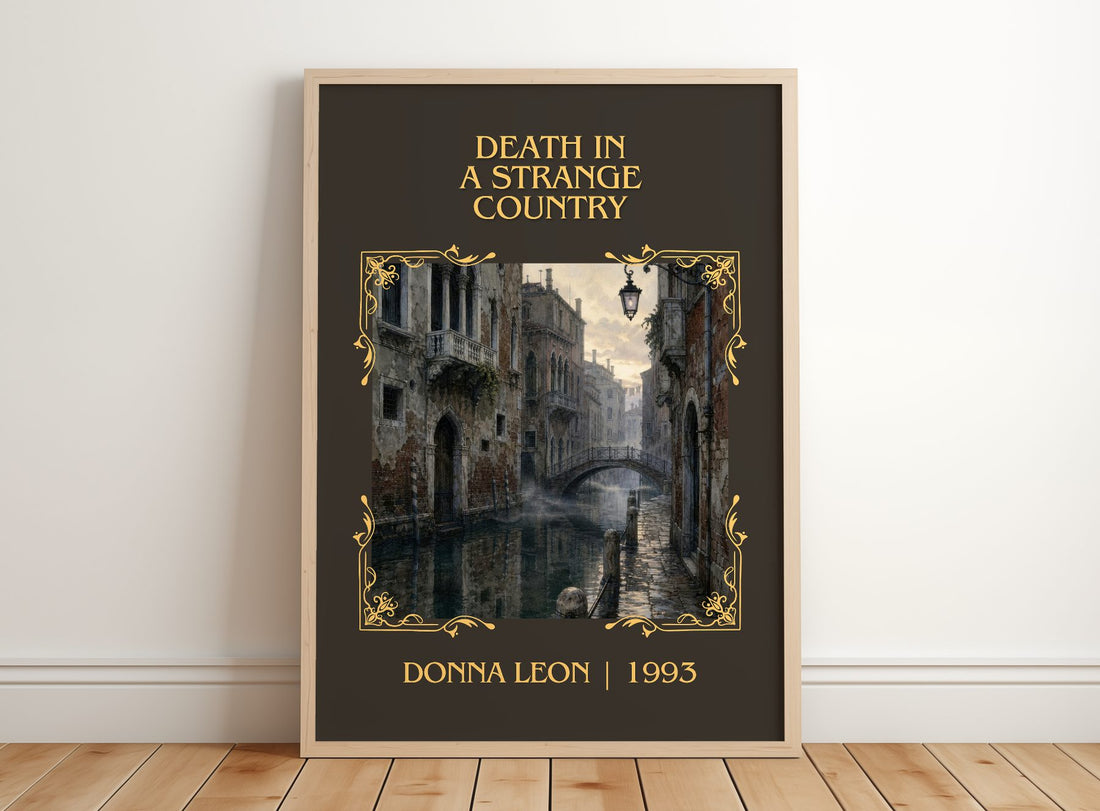 Death in a Strange Country Classic Book Art Print by Donna Leon – framed print leaning on a wooden floor