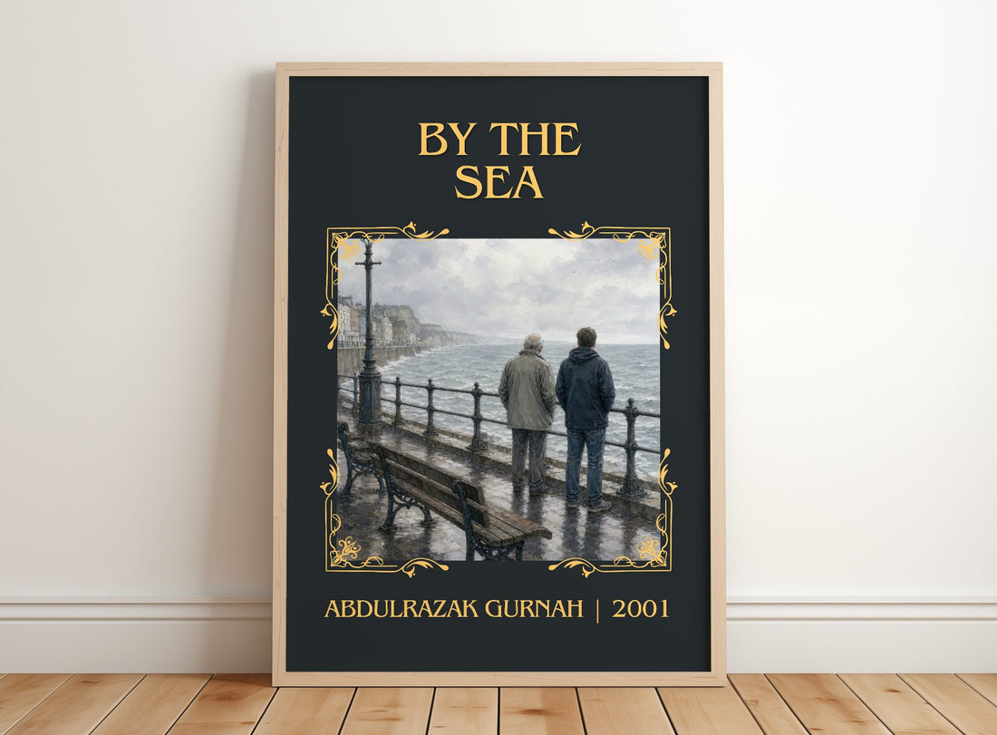 By the Sea Classic Book Art Print by Abdulrazak Gurnah – framed print leaning on a wooden floor