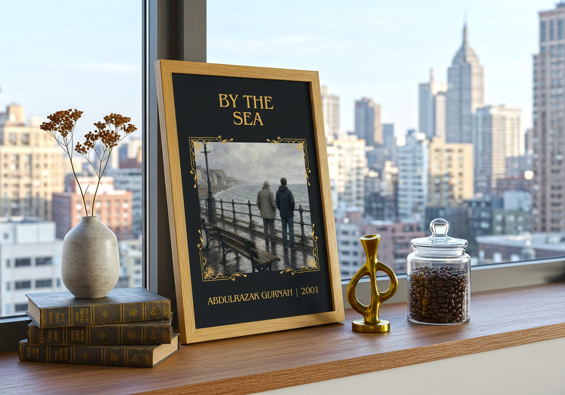By the Sea Classic Book Art Print by Abdulrazak Gurnah – framed print on a city-view windowsill