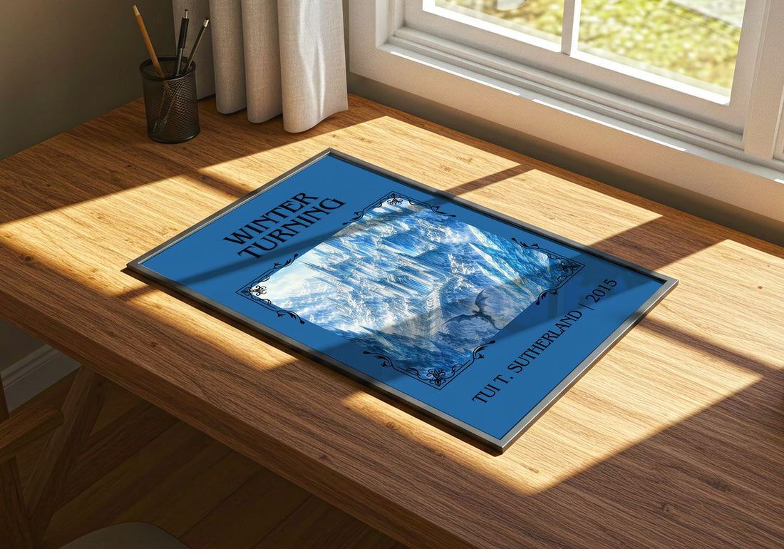 Winter Turning Classic Book Art Print by Tui T. Sutherland – print on a sunlit desk