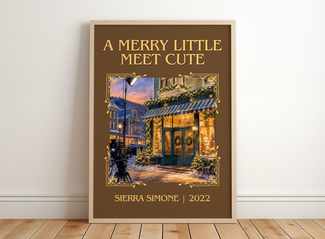 A Merry Little Meet Cute Classic Book Art Print by Sierra Simone – framed print leaning on a wooden floor