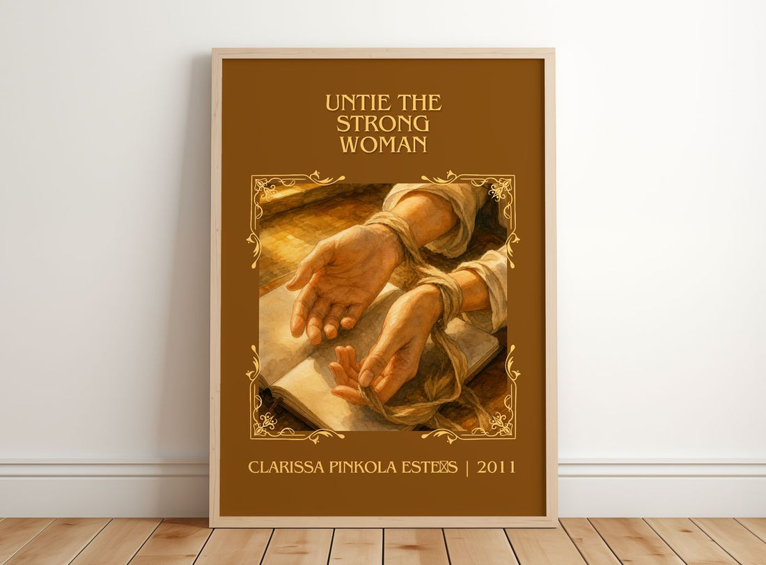 Untie the strong woman Classic Book Art Print by C. Estés – framed print leaning on a wooden floor