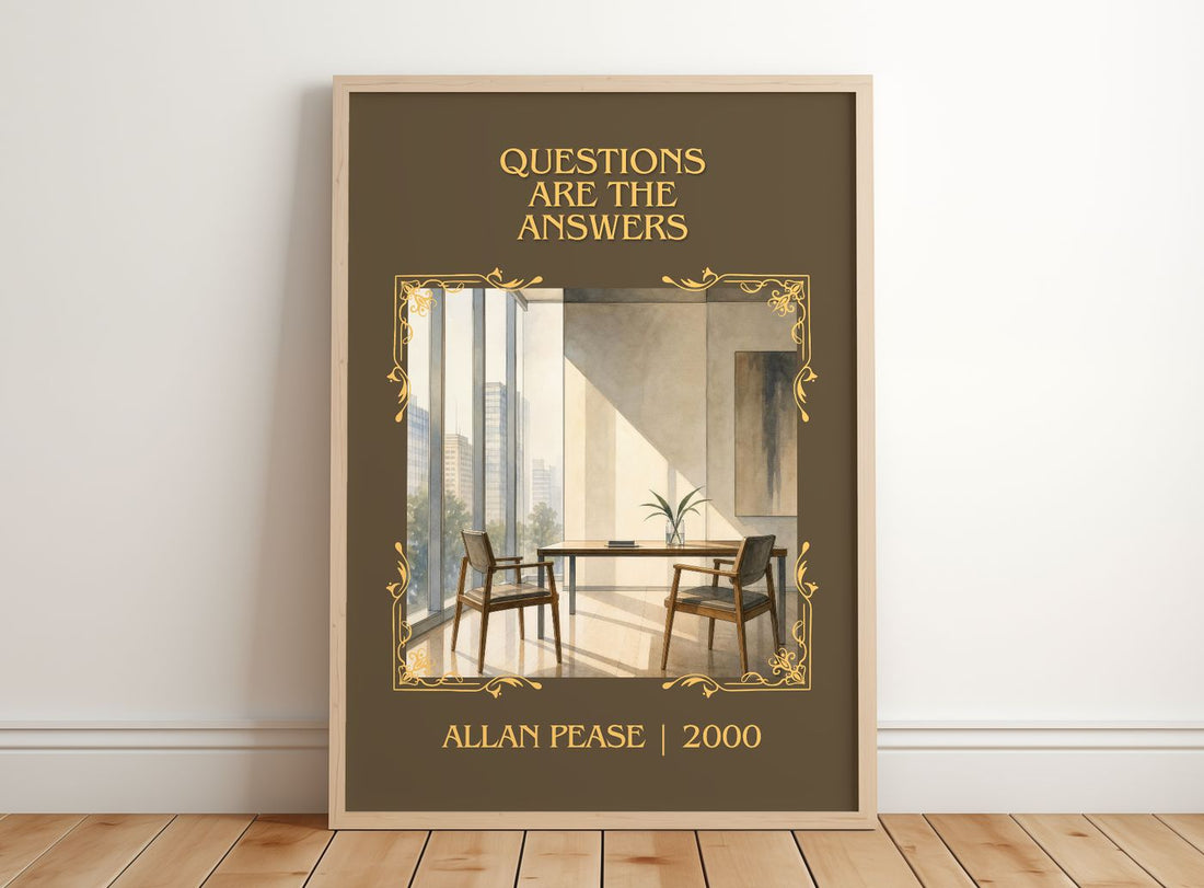 Questions Are the Answers Classic Book Art Print by Allan Pease – framed print leaning on a wooden floor