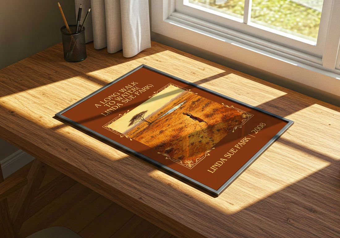 Long Walk to Water( Linda Sue Park) Classic Book Art Print by L. Park – print on a sunlit desk