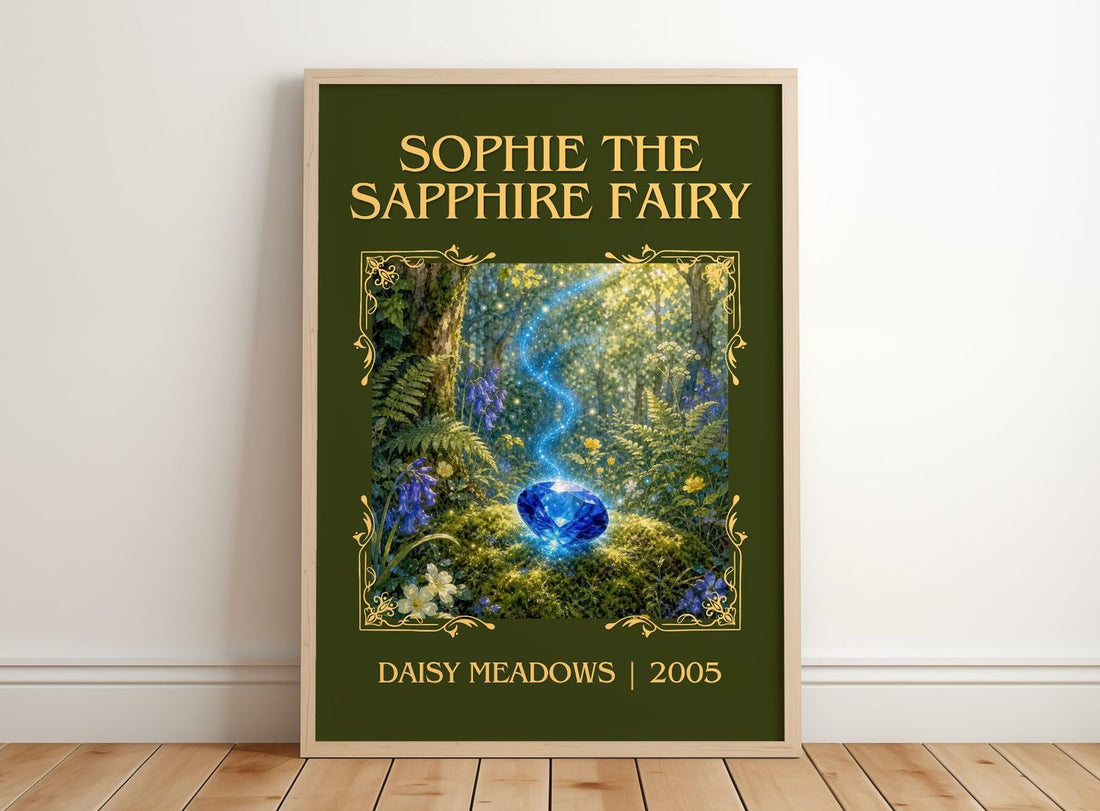 Sophie the Sapphire Fairy Classic Book Art Print by Daisy Meadows – framed print leaning on a wooden floor