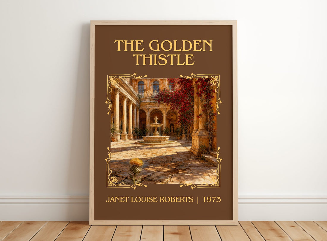 The Golden Thistle Classic Book Art Print by Janet Louise Roberts – framed print leaning on a wooden floor