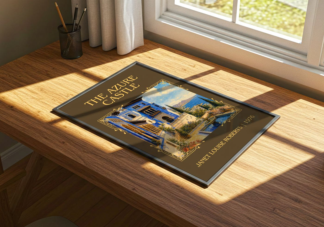 The Azure Castle Classic Book Art Print by Janet Louise Roberts – print on a sunlit desk