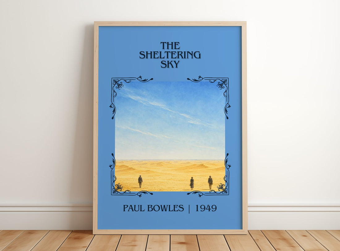 The Sheltering Sky Classic Book Art Print by Paul Bowles – framed print leaning on a wooden floor
