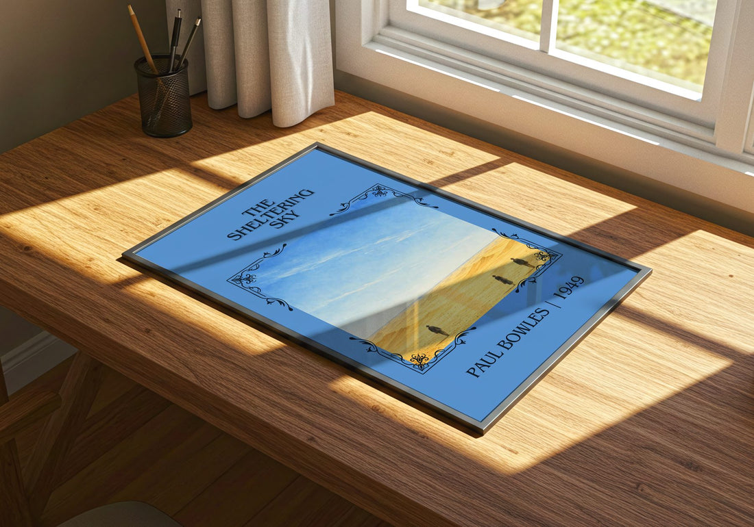 The Sheltering Sky Classic Book Art Print by Paul Bowles – print on a sunlit desk