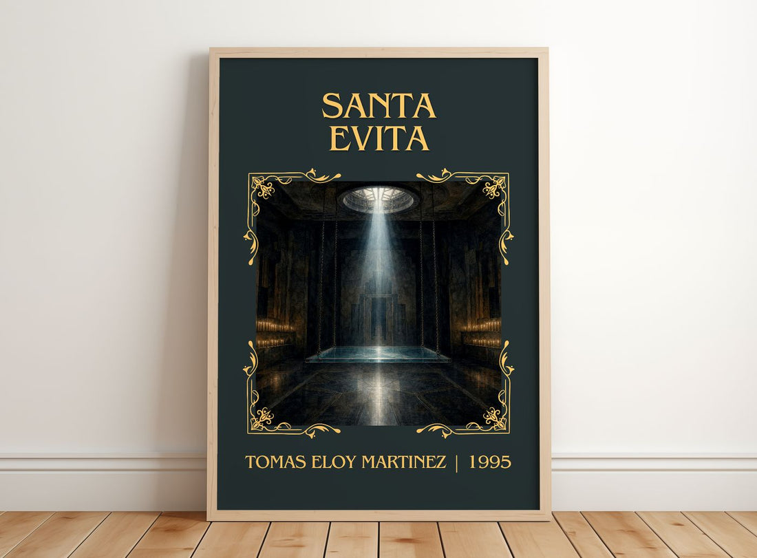 Santa Evita Classic Book Art Print by Tomás Eloy Martínez – framed print leaning on a wooden floor