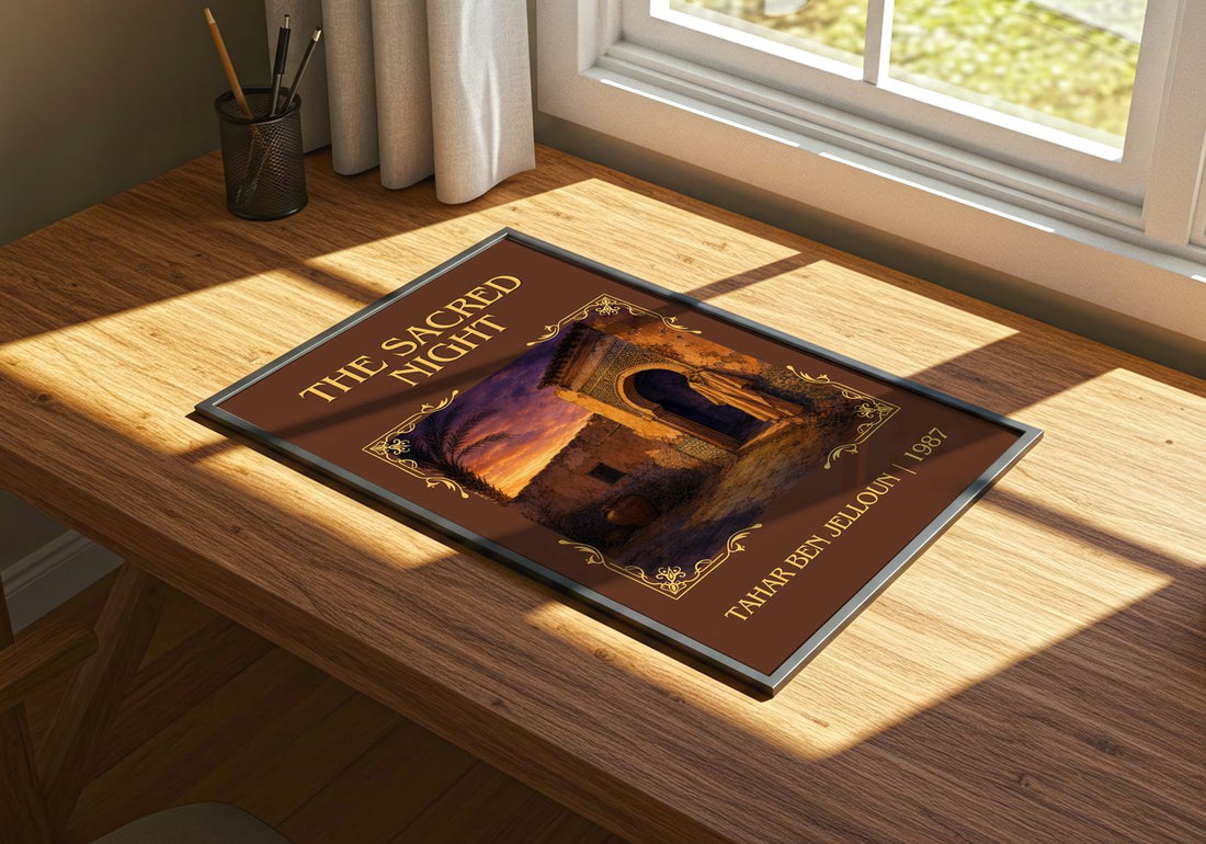 The Sacred Night Classic Book Art Print by Tahar Ben Jelloun – print on a sunlit desk