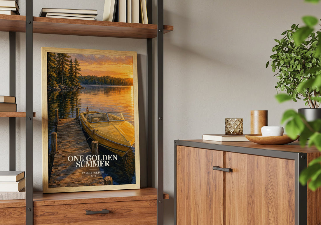 One Golden Summer Book Watercolour Illustration by Carley Fortune – framed print on a shelf by a wooden cabinet