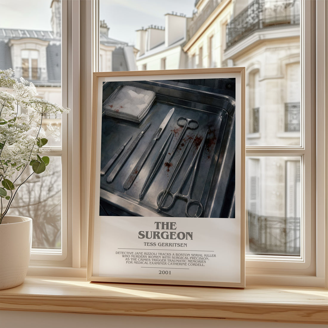 The Surgeon Bookish Wall Art by Tess Gerritsen – framed print by a bright window