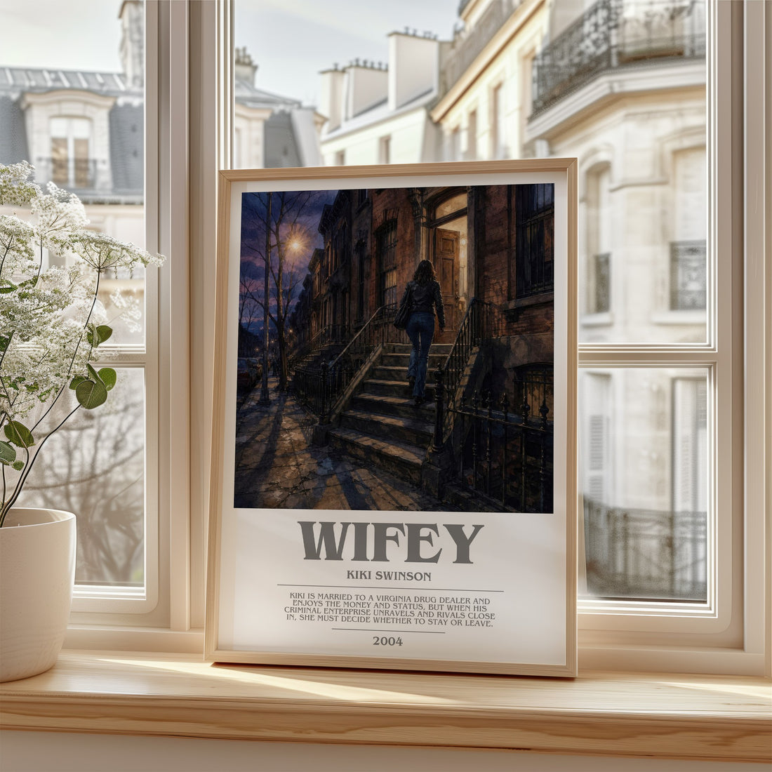 Wifey Bookish Wall Art by Kiki Swinson – framed print by a bright window