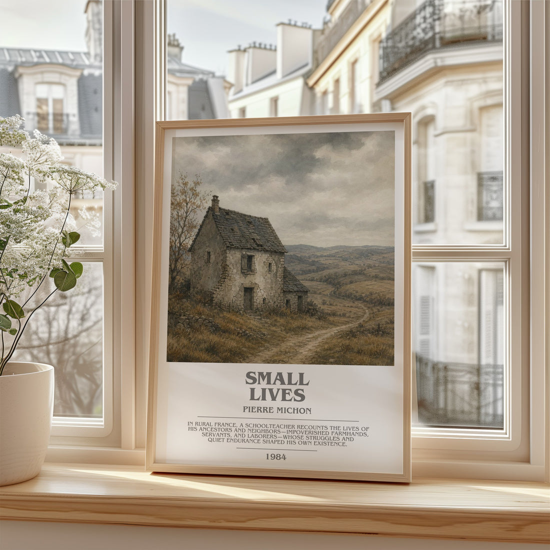 Small Lives Bookish Wall Art by Pierre Michon – framed print by a bright window
