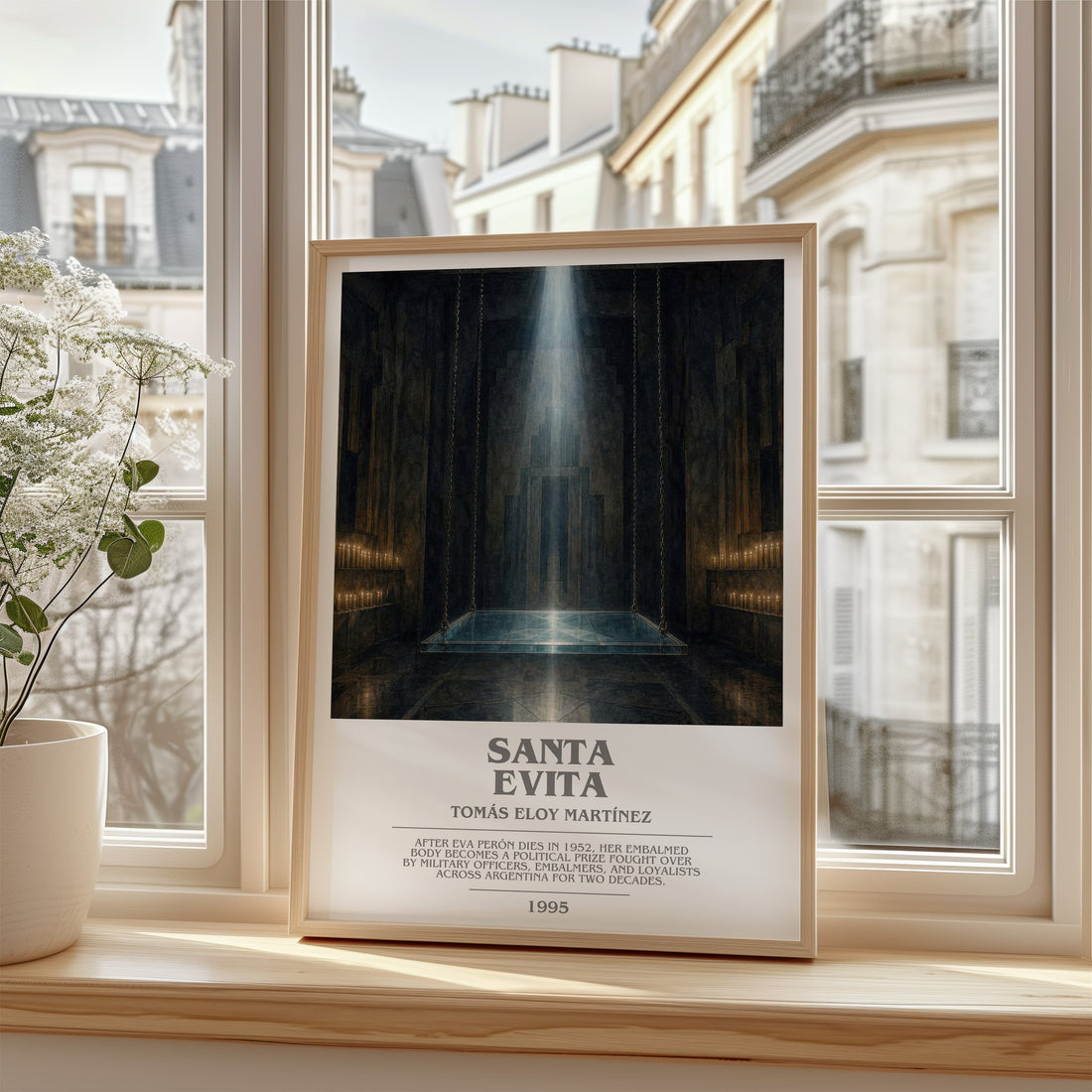 Santa Evita Bookish Wall Art by Tomás Eloy Martínez – framed print by a bright window