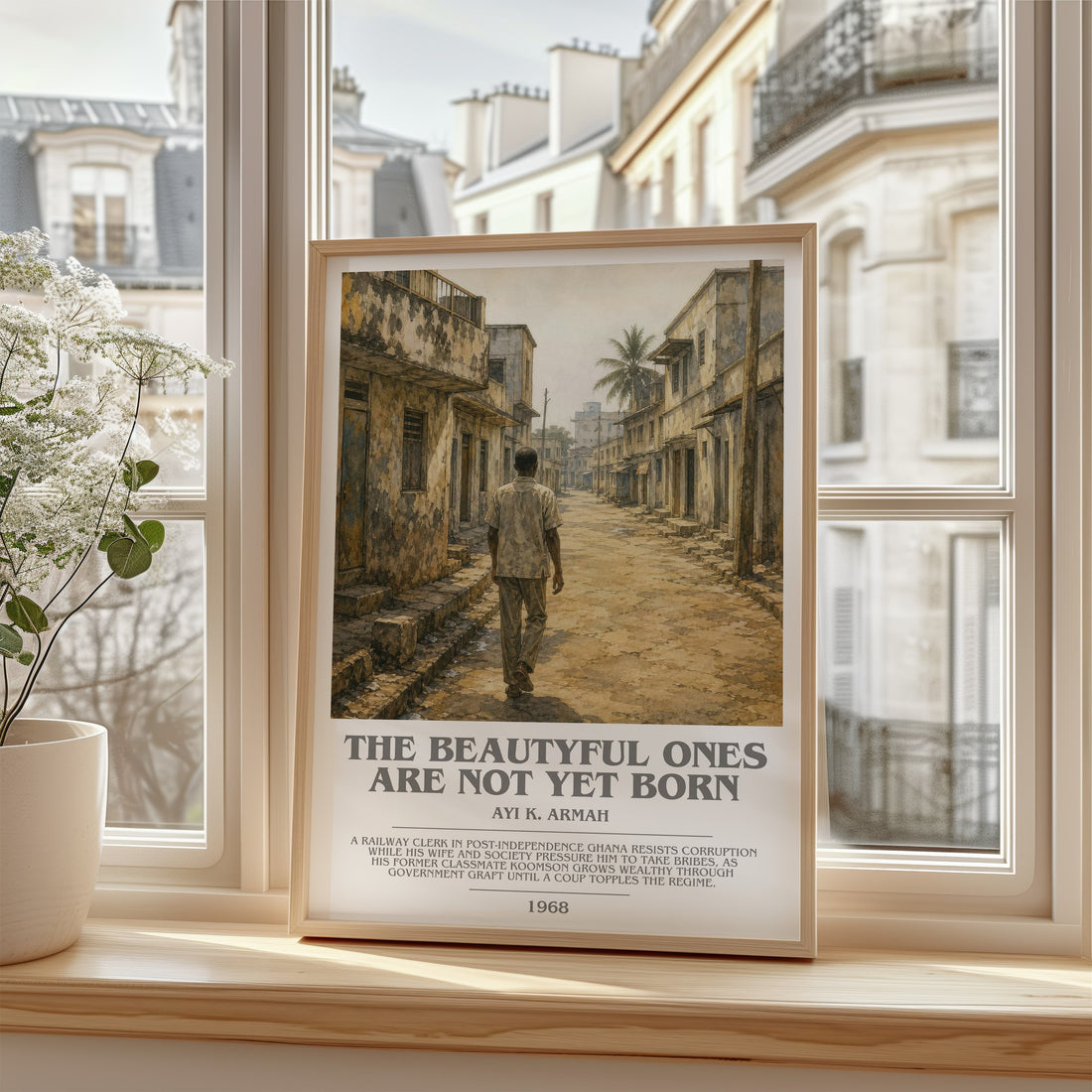 The Beautyful Ones are Not Yet Born Bookish Wall Art by Ayi K. Armah – framed print by a bright window