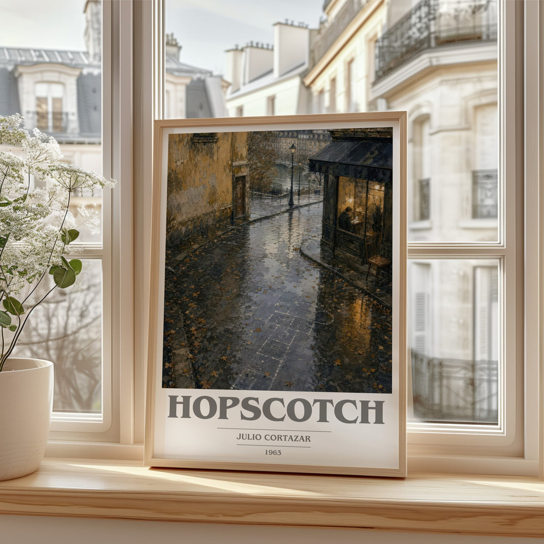 Hopscotch book cover print in frame leaning in hallway – literary fiction wall art