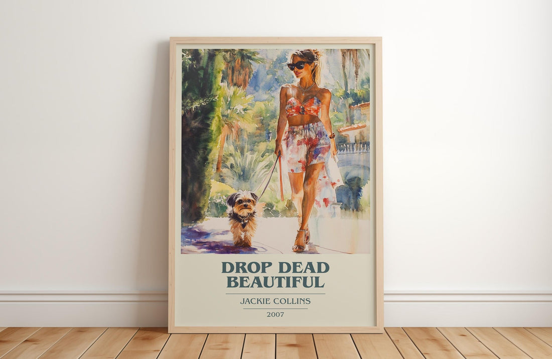 Drop Dead Beautiful book cover print in frame leaning in hallway – romance wall art (mockup)